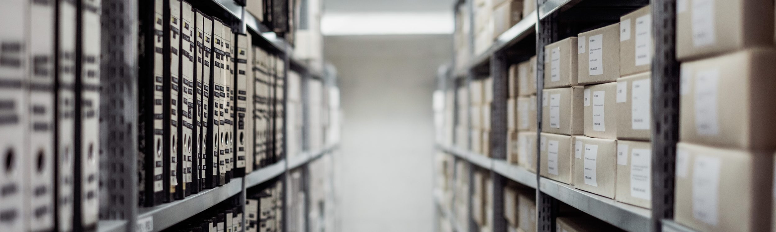 Files stacked on shelves